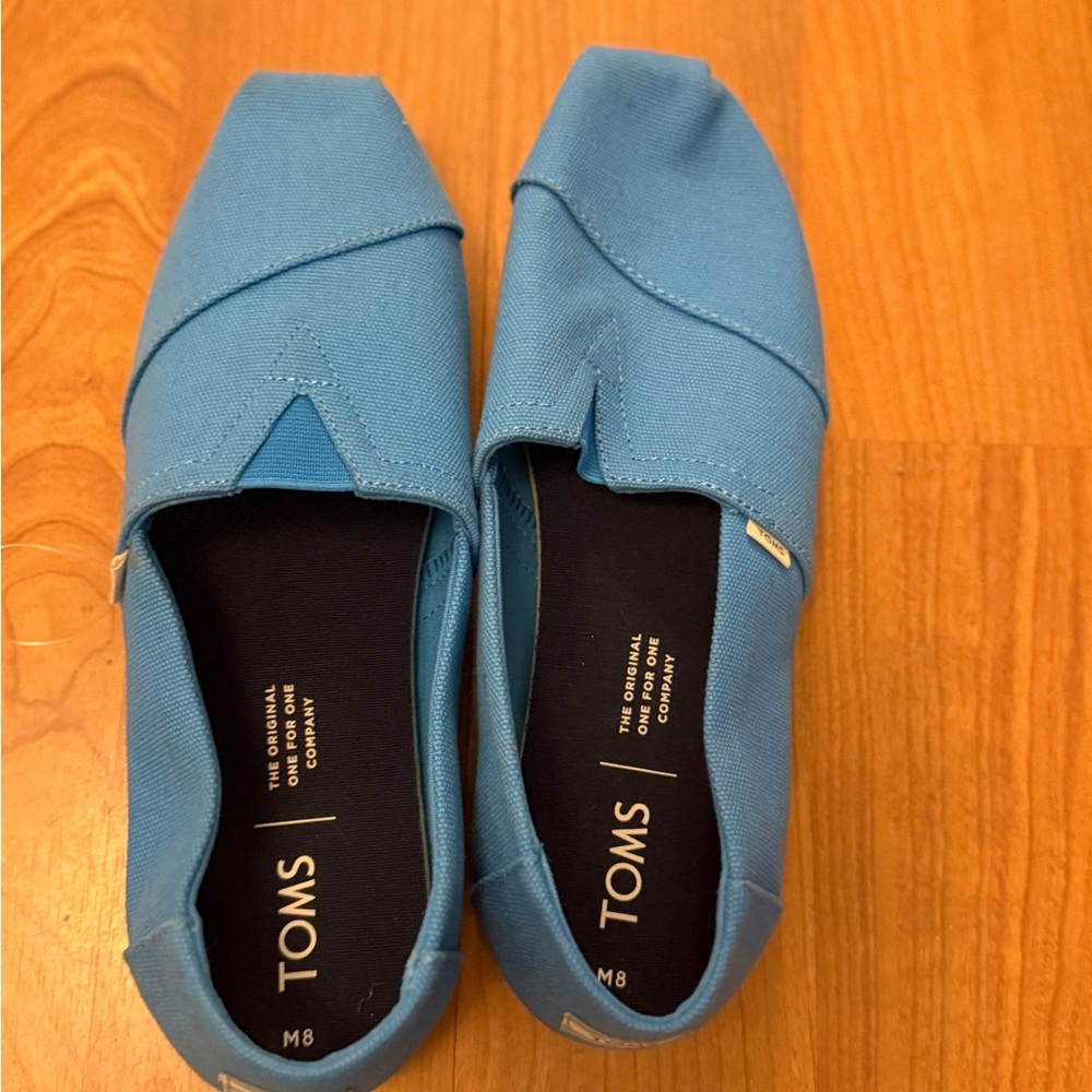 TOMS Light Blue Casual Slip-Ons